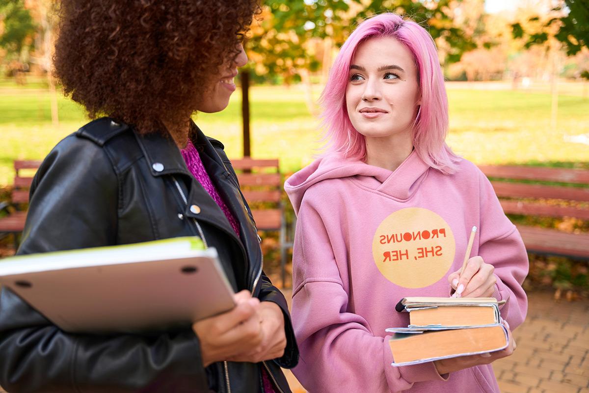 Female students talking to each other on campus